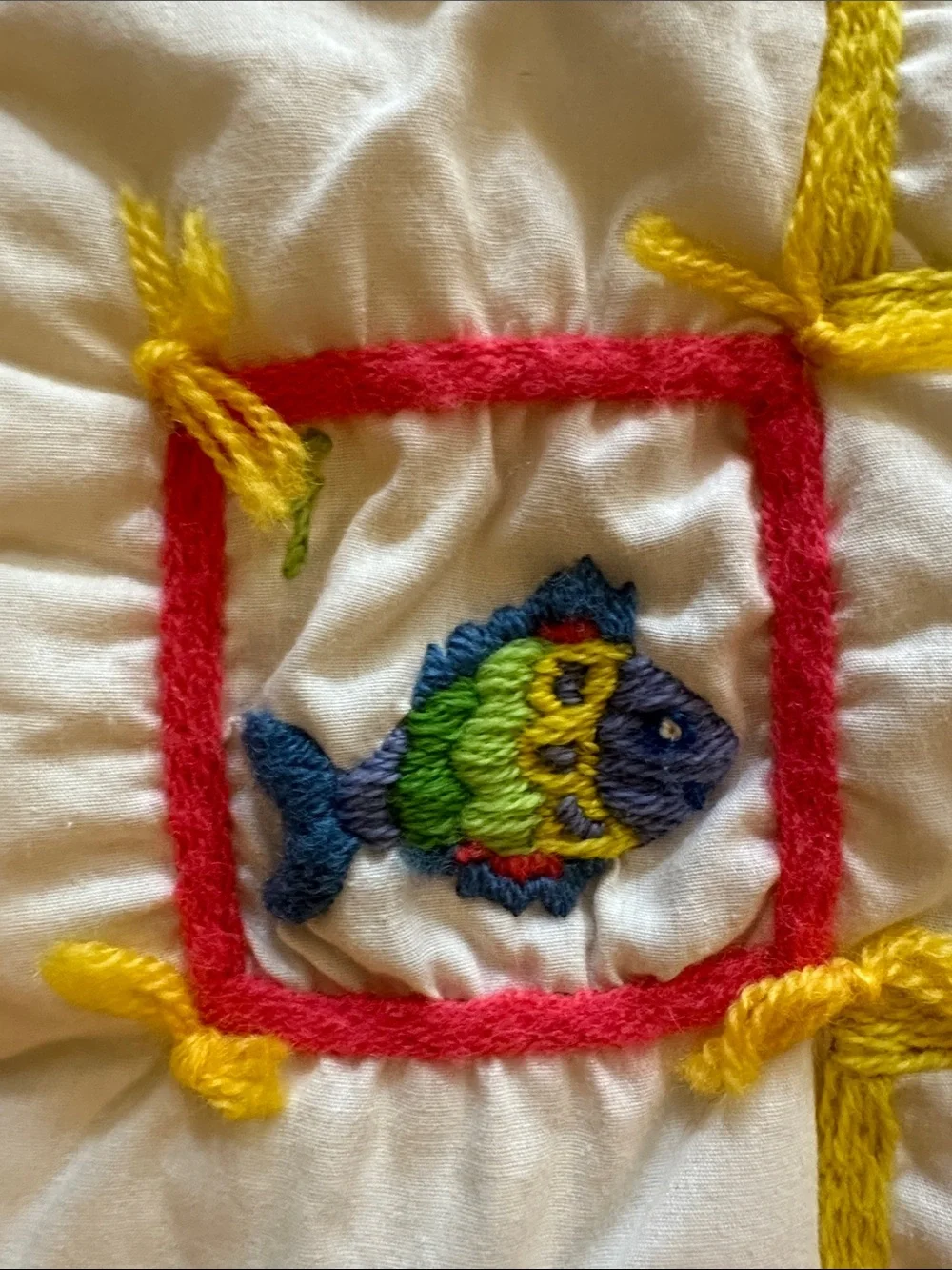 Handmade baby, toddler ABCs embroidered quilt with yellow gingham backing, 1979